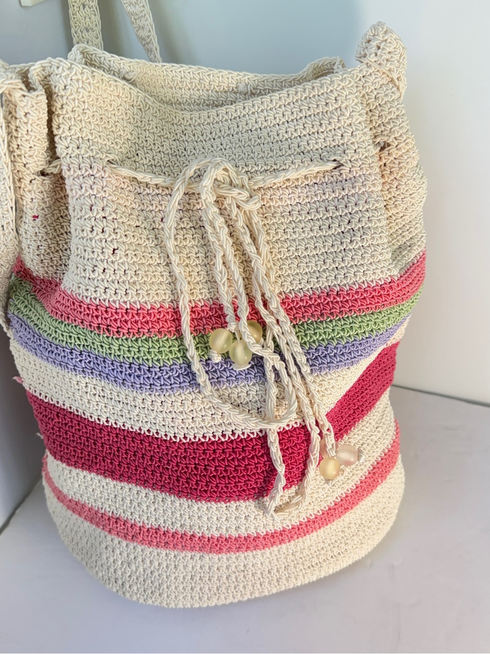 Liz Claiborne crochet drawstring bucket bag striped great cond clean,pink inside